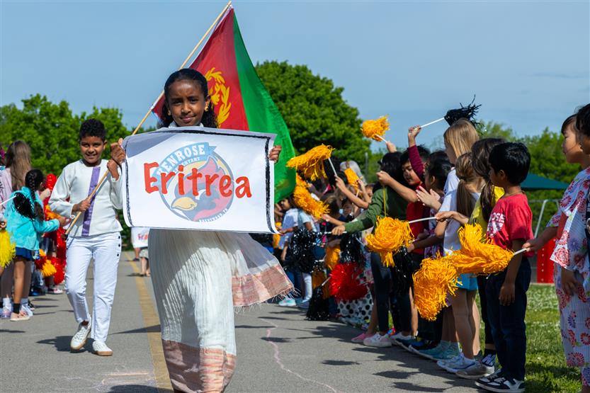 Students participate in flag parade